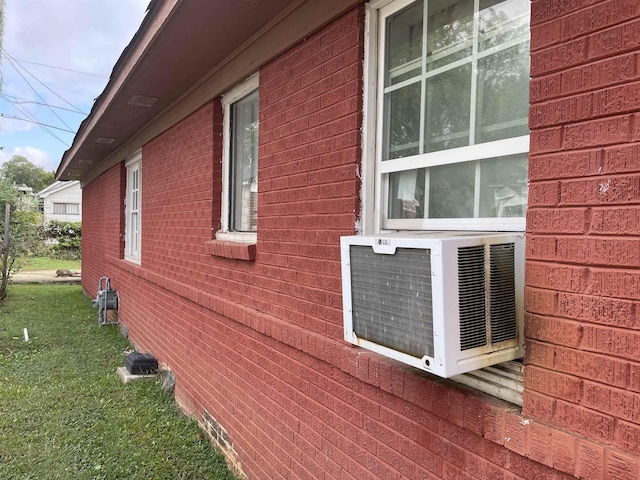 view of side of home featuring cooling unit