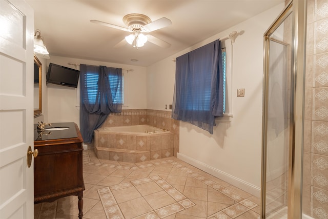 bathroom with ceiling fan, vanity, tile patterned flooring, and separate shower and tub