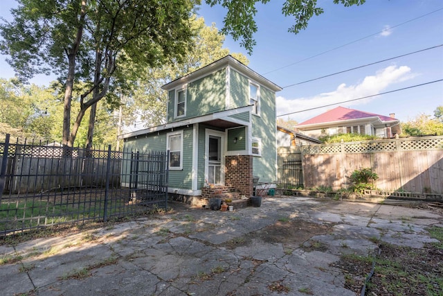 view of front of home featuring a patio