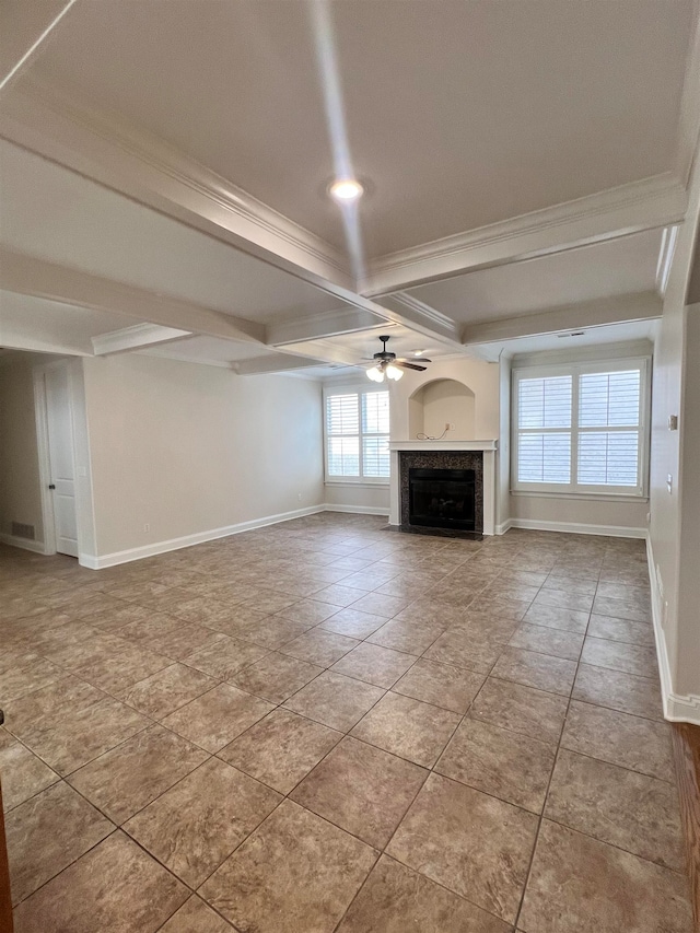 unfurnished living room with beamed ceiling, ceiling fan, and ornamental molding