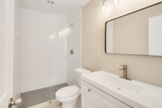 bathroom with vanity, an enclosed shower, and toilet