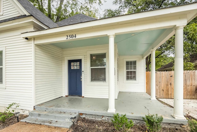 doorway to property featuring a porch