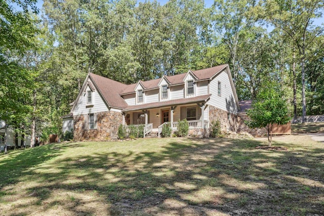 view of front of home with a front lawn and covered porch