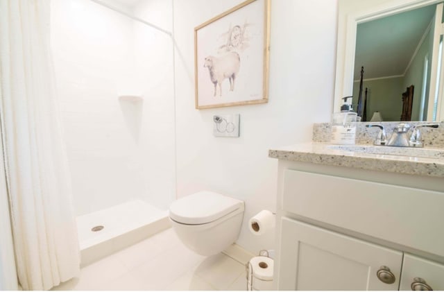 bathroom with curtained shower, vanity, toilet, and tile patterned floors