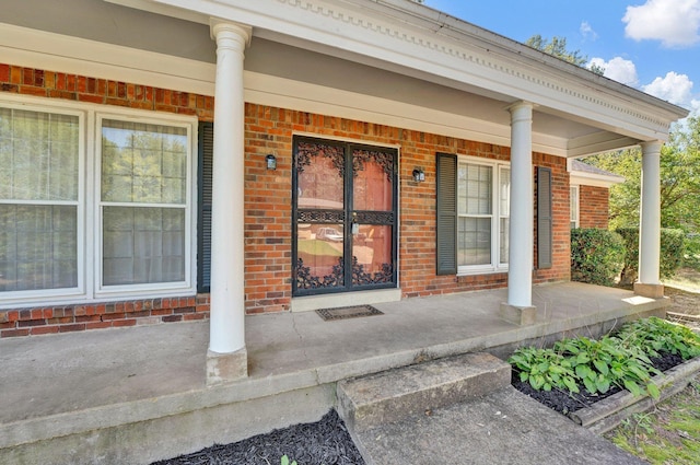 entrance to property with a porch