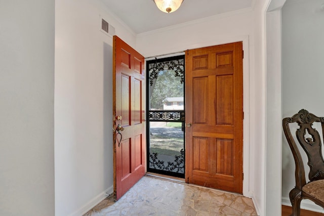 foyer with ornamental molding