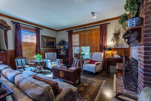 living room with a wealth of natural light, a textured ceiling, a fireplace, and crown molding