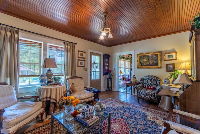 living room featuring ornamental molding, wooden ceiling, and hardwood / wood-style flooring