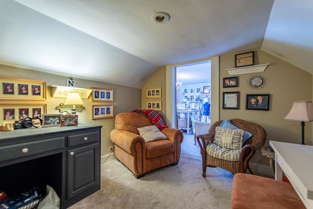 living room with lofted ceiling and light carpet