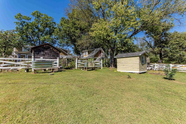 view of yard with a storage shed