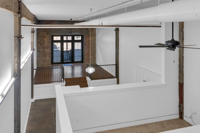 interior space featuring french doors and ceiling fan