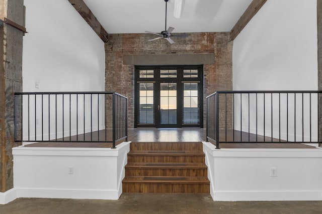 entrance to property with ceiling fan and french doors