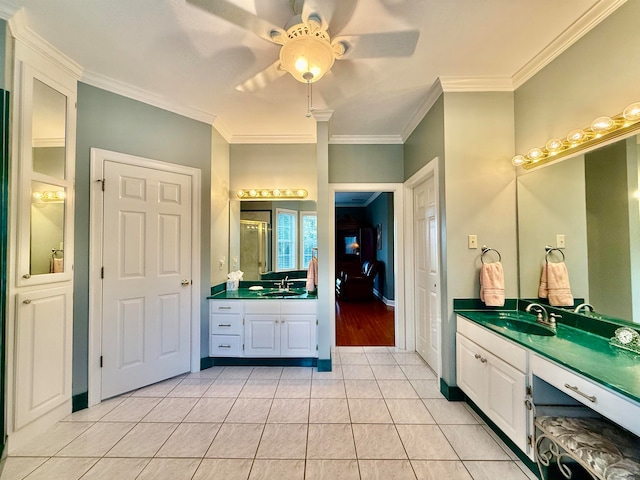 bathroom featuring tile patterned floors, ceiling fan, vanity, and crown molding