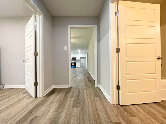 hall featuring light hardwood / wood-style floors