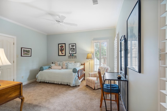 bedroom featuring crown molding, carpet, and ceiling fan