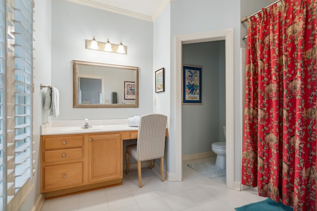 bathroom with ornamental molding, curtained shower, vanity, and toilet