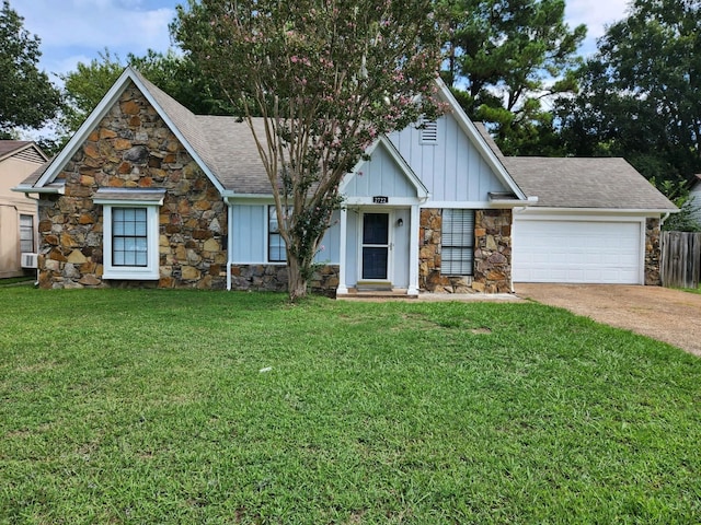 view of front of property with cooling unit, a garage, and a front lawn