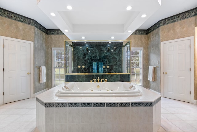 bathroom featuring a healthy amount of sunlight, tile patterned flooring, and plus walk in shower