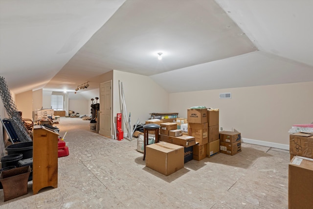 additional living space featuring vaulted ceiling