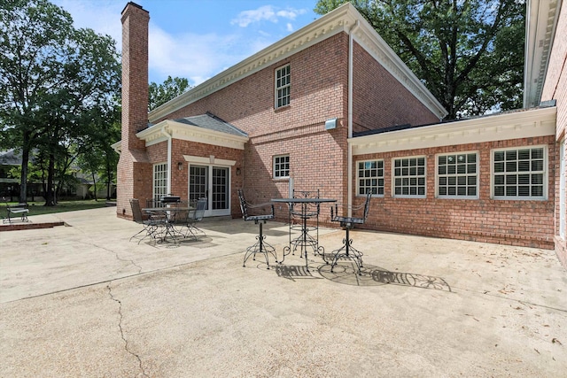 rear view of house featuring a patio