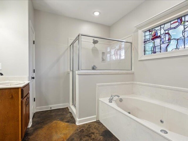 bathroom featuring vanity and separate shower and tub