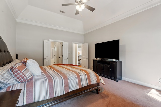 carpeted bedroom featuring ceiling fan, a raised ceiling, and crown molding