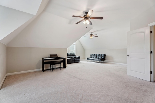 bonus room featuring light colored carpet, vaulted ceiling, and ceiling fan