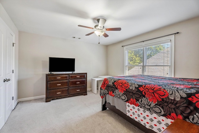 carpeted bedroom with ceiling fan