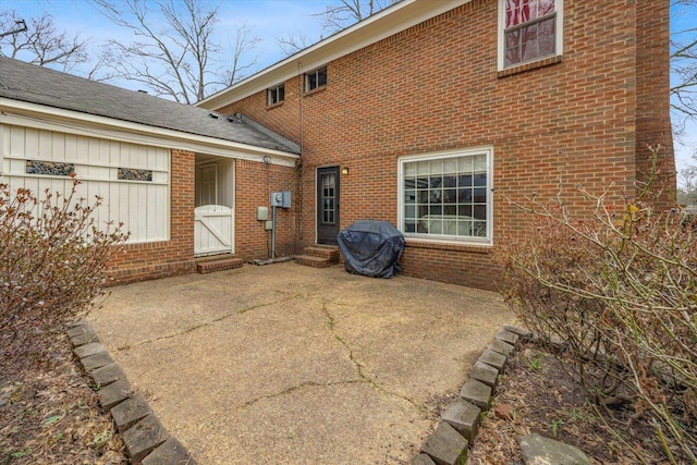 back of property with a patio area