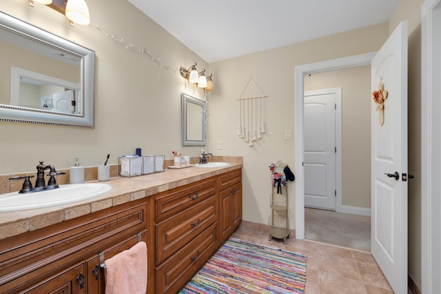 bathroom featuring vanity and tile patterned flooring