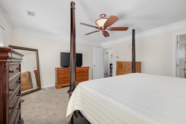 bedroom featuring light carpet, crown molding, and ceiling fan