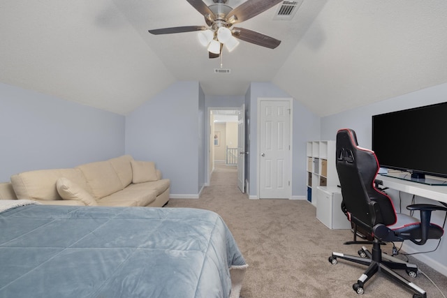 carpeted bedroom featuring lofted ceiling and ceiling fan