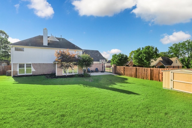 view of yard with a storage shed