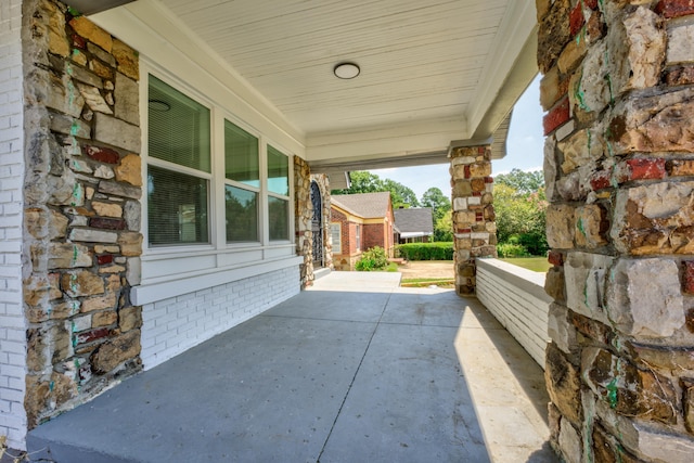 view of patio featuring a porch