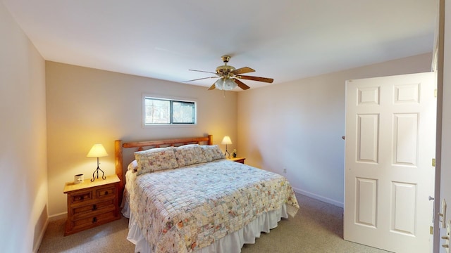 bedroom featuring ceiling fan and carpet floors