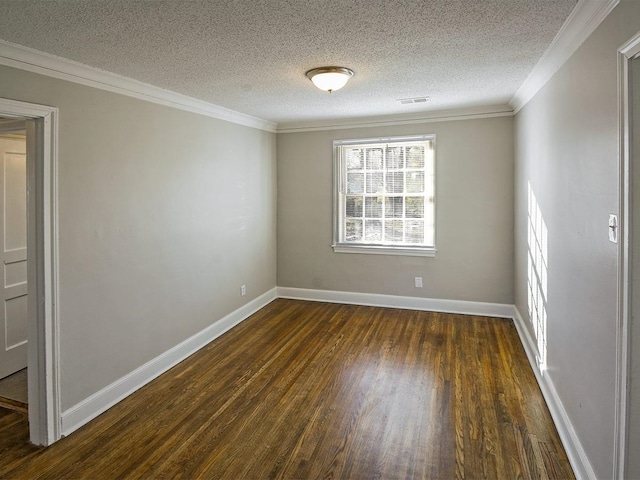 spare room with a textured ceiling, dark hardwood / wood-style floors, and crown molding