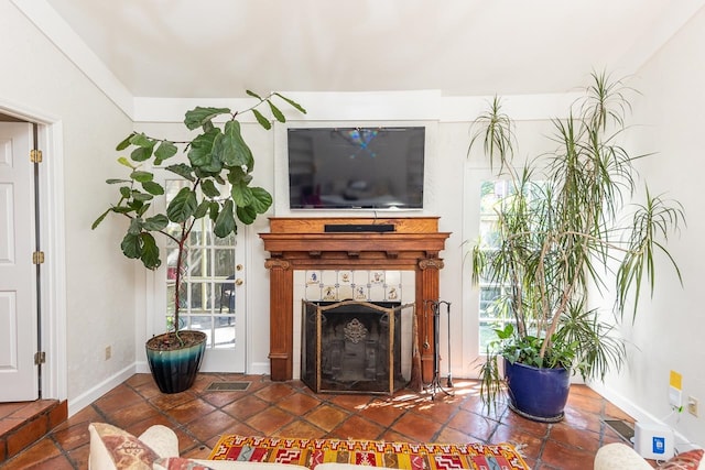 unfurnished living room featuring a fireplace