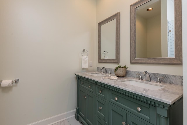 bathroom featuring tile patterned floors and vanity