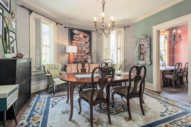 dining room featuring plenty of natural light, a chandelier, and hardwood / wood-style flooring