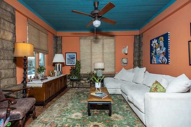 living room with wood ceiling, ornamental molding, ceiling fan, and tile patterned floors