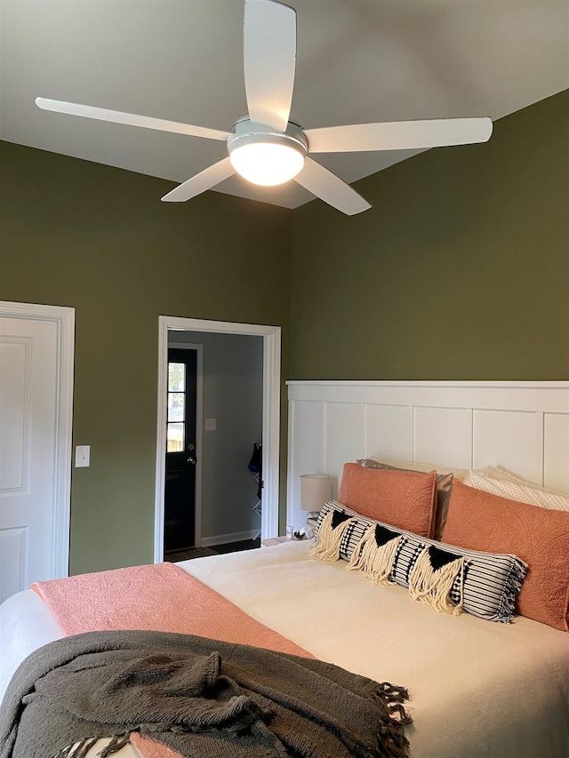 bedroom with vaulted ceiling and ceiling fan