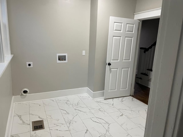 clothes washing area featuring washer hookup and hookup for an electric dryer