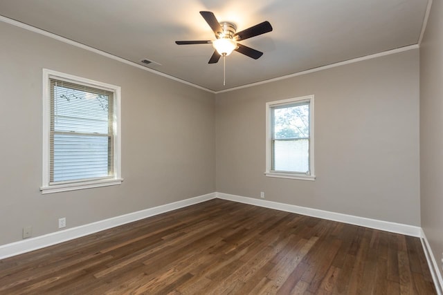 unfurnished room featuring ornamental molding, ceiling fan, and dark hardwood / wood-style floors