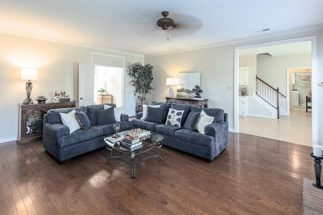 living room with ceiling fan, dark hardwood / wood-style floors, and crown molding