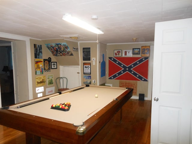 game room featuring billiards, dark hardwood / wood-style floors, and ornamental molding