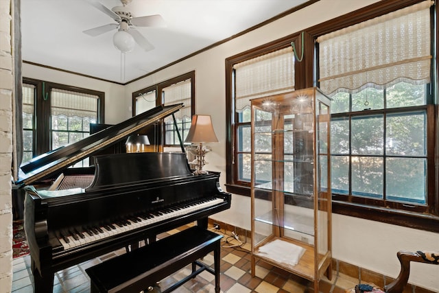 misc room featuring ornamental molding and ceiling fan