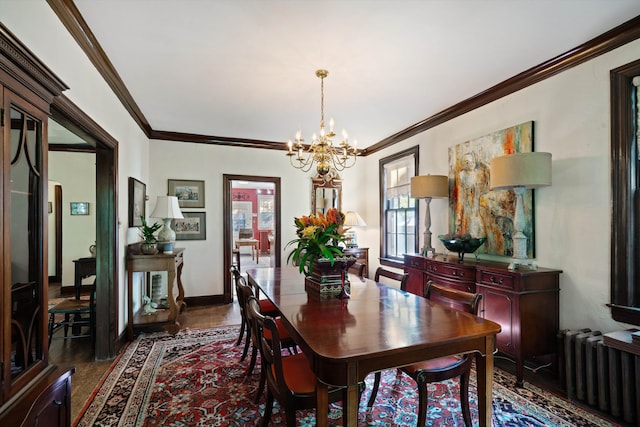 dining area featuring radiator, a notable chandelier, crown molding, and dark hardwood / wood-style flooring