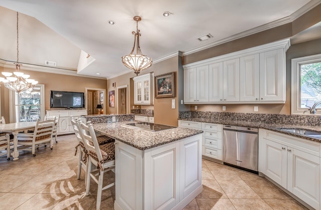 kitchen featuring dishwasher, white cabinetry, and decorative light fixtures