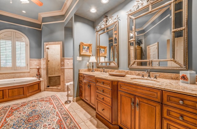 bathroom featuring tile walls, vanity, tile patterned flooring, shower with separate bathtub, and ornamental molding