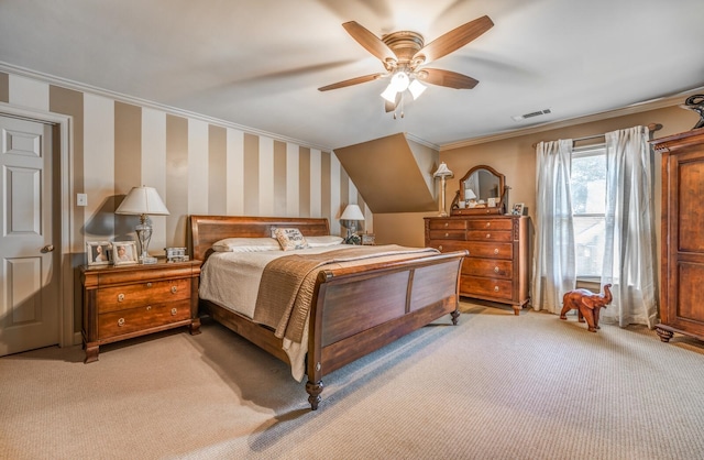 bedroom with ornamental molding, light carpet, and ceiling fan